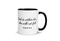 White ceramic mug with black handle and interior, black script text "God is within her, she will not fall," Psalm 46:5